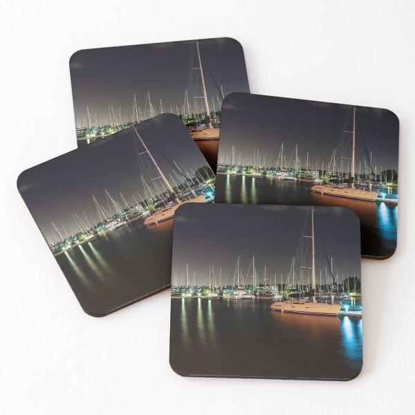 Item preview, Sailing boats light up the harbour in the night sky with blurry long exposer water designed and sold by James-Cole.