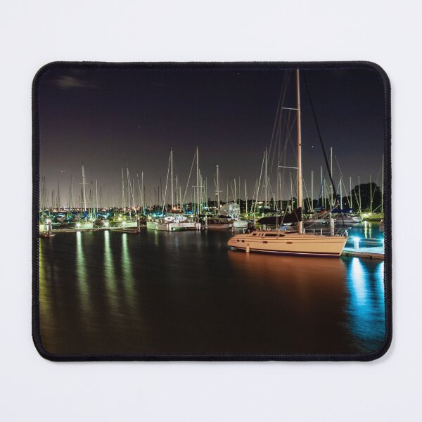 Item preview, Sailing boats light up the harbour in the night sky with blurry long exposer water designed and sold by James-Cole.