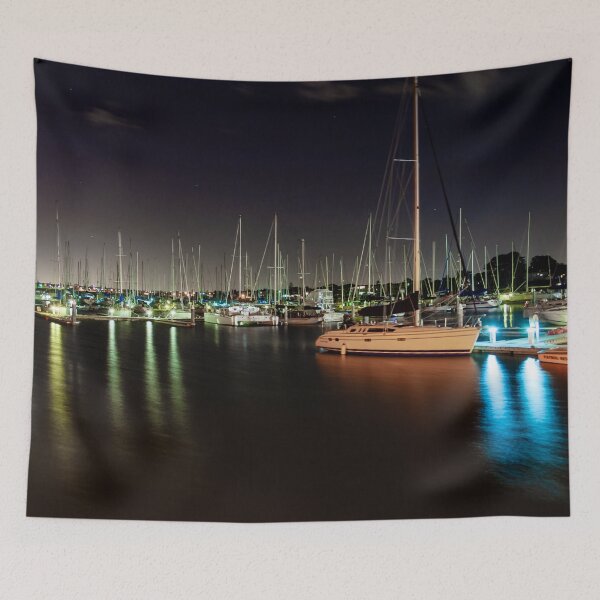 Item preview, Sailing boats light up the harbour in the night sky with blurry long exposer water designed and sold by James-Cole.