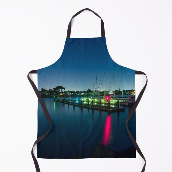 Item preview, Long exposure of coastal harbour at night with boat lights reflecting in the blurry water designed and sold by James-Cole.