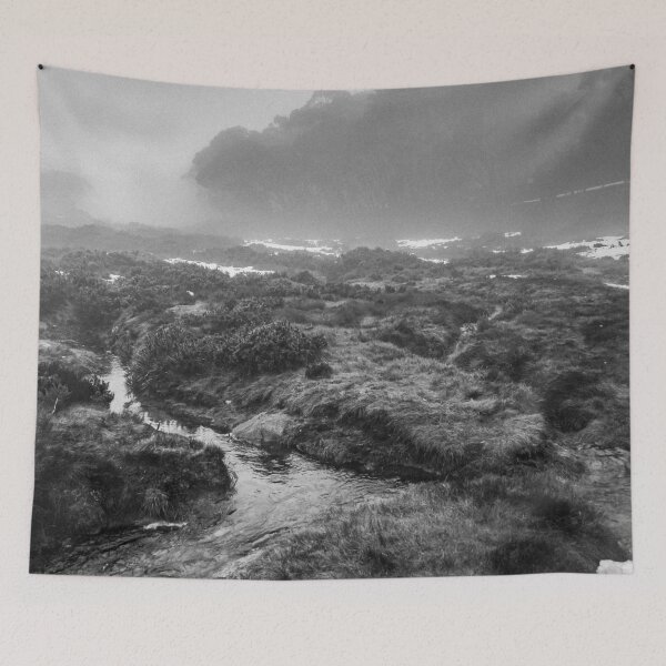 Item preview, Alpine streams cutting through a foggy landscape of grass and snow in black and white designed and sold by James-Cole.