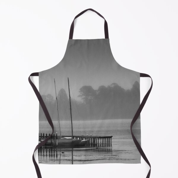 Item preview, Sail boats moored at Lake Wendouree jetty on a cold misty morning in Black and White designed and sold by James-Cole.