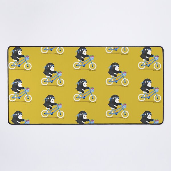 Penguin on a Bike Desk Mat