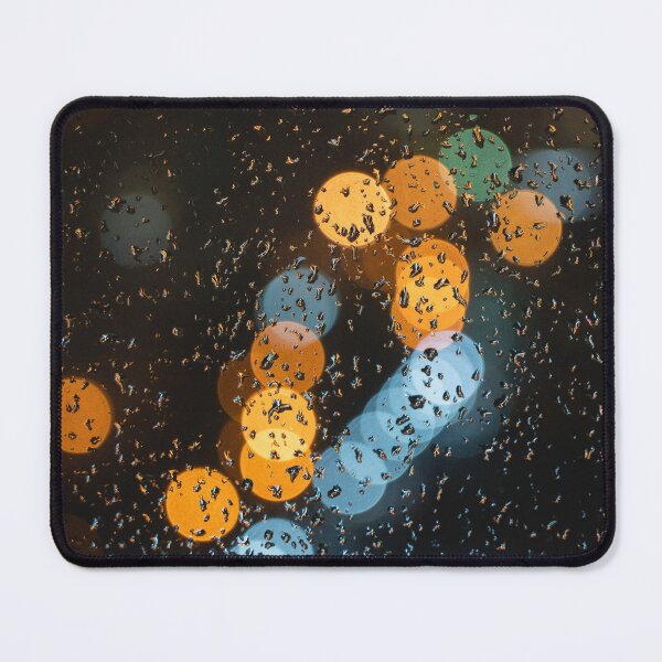 Item preview, Blurred bokeh city lights, raindrops on window glass designed and sold by anstey.
