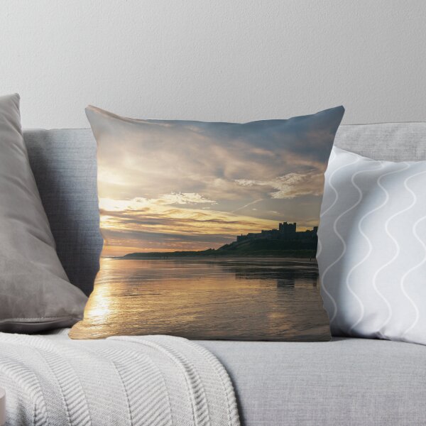 Bamburgh castle reflection Throw Pillow