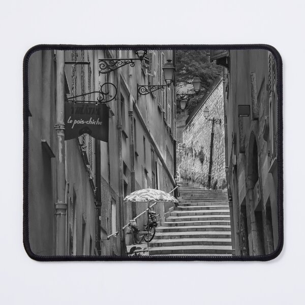 Item preview, Original fine art photo print featuring a black and white view of a narrow crooked street in the Old Town, Vieille Ville in Nice on the French Riviera. designed and sold by SvetlanaSF.