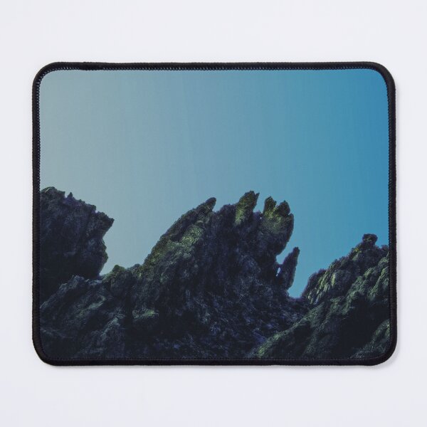 Item preview, Scenery black mountain rocks shinning with the first sunrise lights at a high altitude with a very clear blueish sky designed and sold by Alahyane Said.