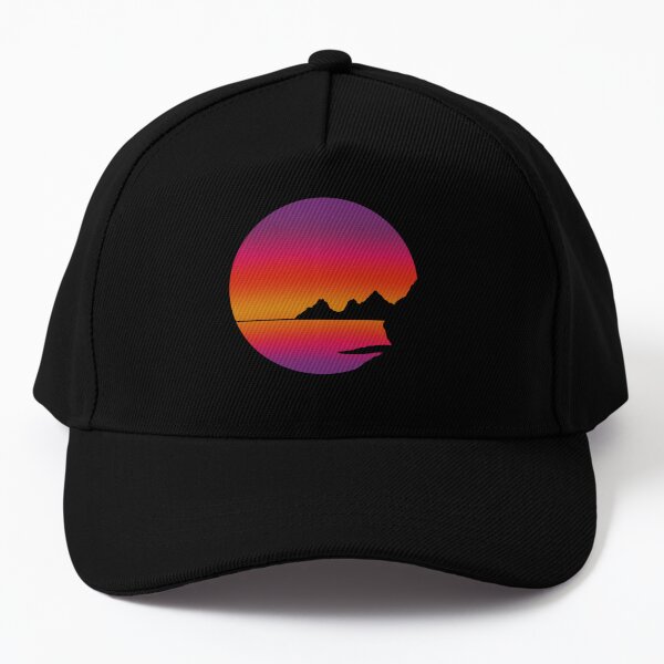 Sunrise on water with mountains in the background Baseball Cap