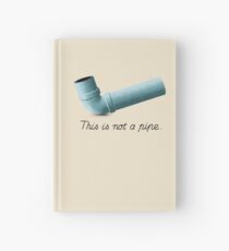 Ceci n'est pas une pipe Hardcover Journal