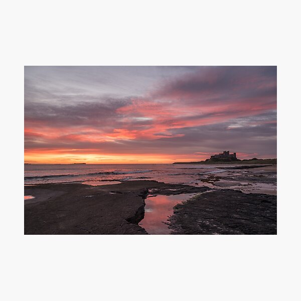 Sunrise At Bamburgh Castle in Northumberland. Photographic Print