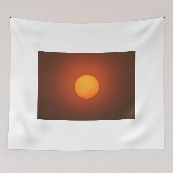 Item preview, Sun filter through smoky skies of California wildfires 2020 designed and sold by yhelfman.