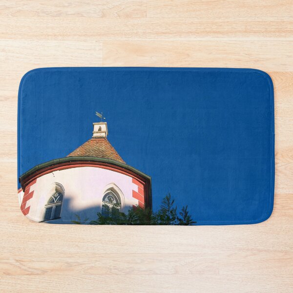 Item preview, Castle tower in autumnal evening light against a clear blue sky designed and sold by frankuffmann.
