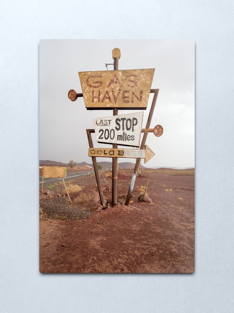 Alternate view of Tall vintage gas sign standing in the desert Metal Print