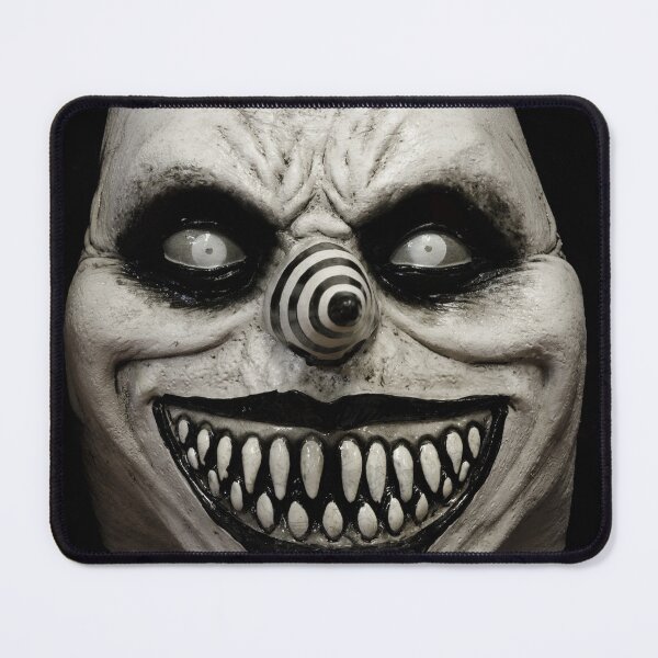Item preview, Laughing Jack Clown Face Mask Isolated Against Black Background designed and sold by yhelfman.