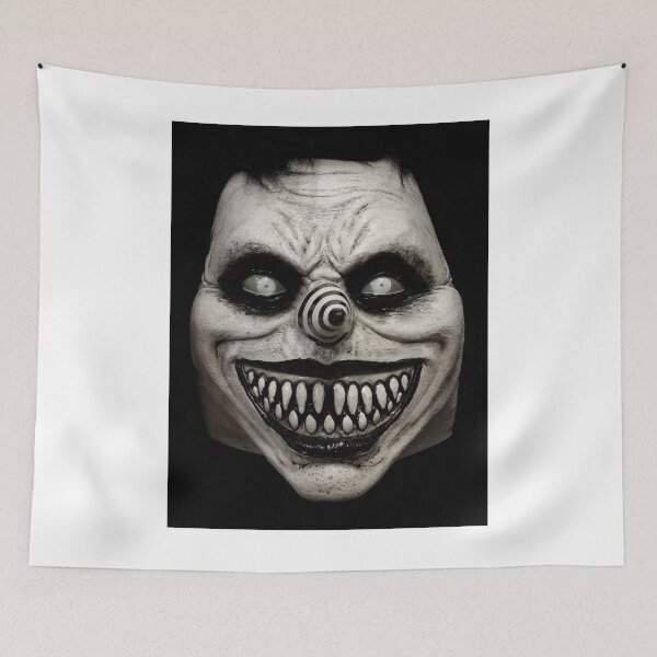 Item preview, Laughing Jack Clown Face Mask Isolated Against Black Background designed and sold by yhelfman.
