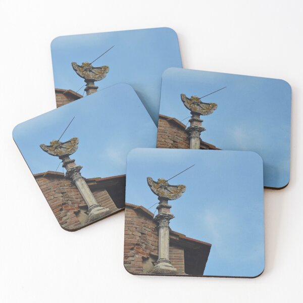 Item preview, An old stone sundial on a roof seen against a blue sky. designed and sold by EAnneH.