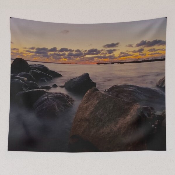 Item preview, Rocks in the sea during sunset designed and sold by HenrikGPhoto.