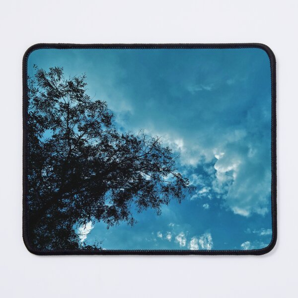 Item preview, A Blue Dreamy Sky with Tree Branches & Scattered Cotton Candy Clouds - Photography designed and sold by By Roqia.