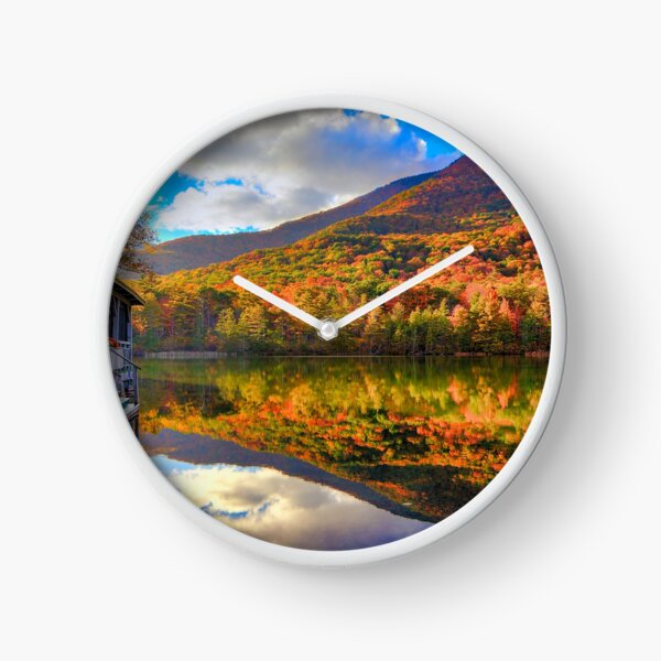 Lake with reflection and mountain Clock