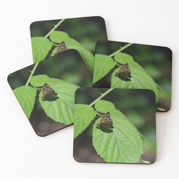 Item preview, Speckled Wood Butterfly on a leaf designed and sold by RumRagephotos.