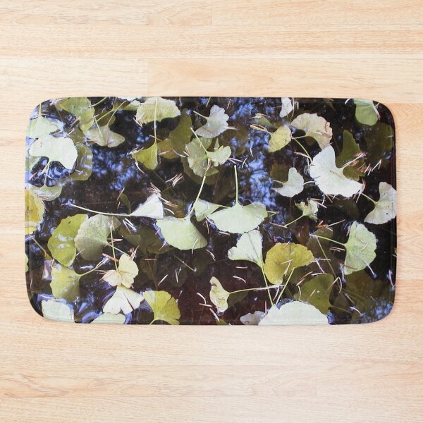 Item preview, Ginkgo Tree Leaves Floating on a Pond in Autumn designed and sold by JariHawk.