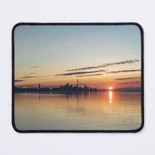 Item preview, Half a Sunrise - Toronto Skyline From Across Silky Calm Lake Ontario designed and sold by Georgia Mizuleva.