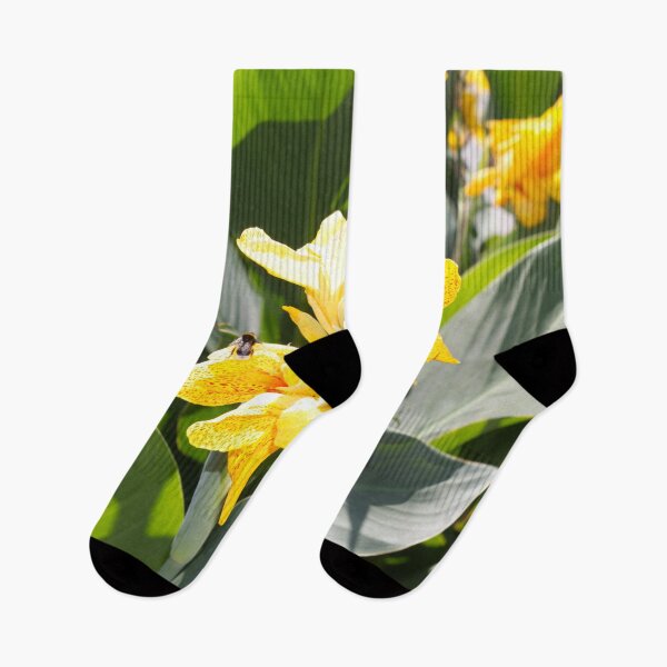 Item preview, The yellow speckled canna lily with pollinating bee on it designed and sold by IraNiva.