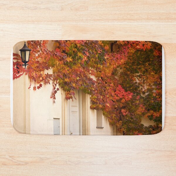 Item preview, the wall of an old house covered with colorful creeper leafs  designed and sold by goceris.