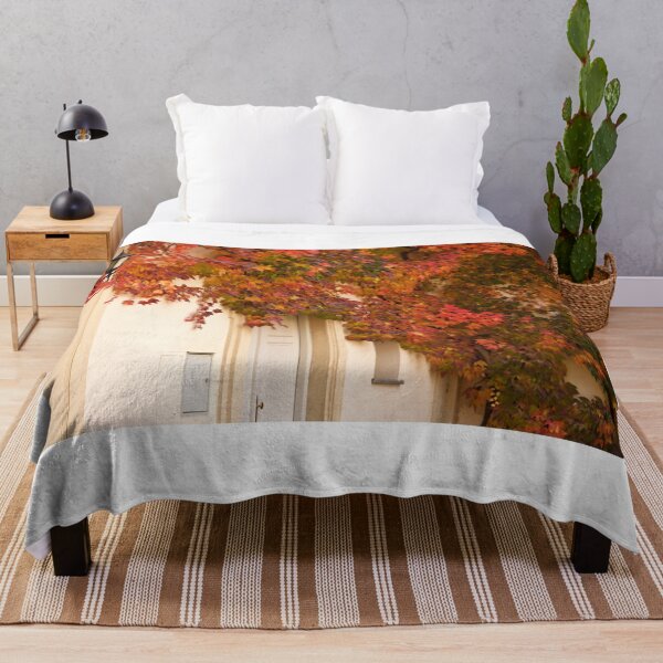 Item preview, the wall of an old house covered with colorful creeper leafs  designed and sold by goceris.