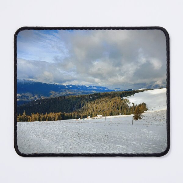 Item preview, Maravilloso paisaje en la cima del monte Dovga, montañas de los Cárpatos, Bukovel, Ucrania. Un hermoso día en las montañas cubiertas de nieve blanca. Cielo azul con nubes blancas y grises. designed and sold by trinitronboy.
