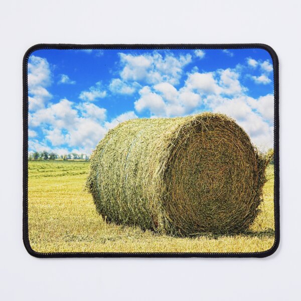 Item preview, Hay bale on stubble field against cloudy sky taken closeup. designed and sold by IaroslavB.