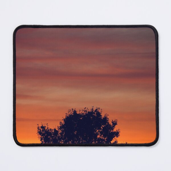 Item preview, Digital photograph. of tree silhouette against a sunrise sky designed and sold by SimonJohnson1.
