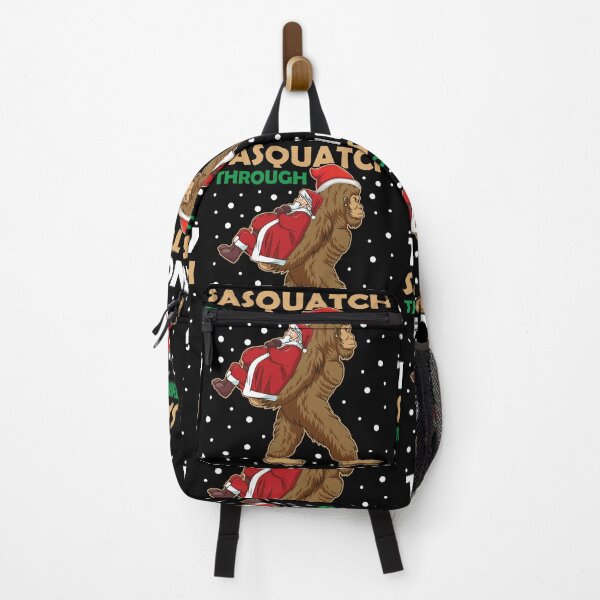 Item preview, Sasquatch Through The Snow Funny Santa Abduction designed and sold by GravitiTees.