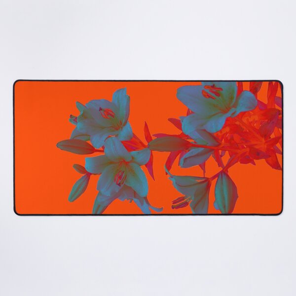 Lilies on a LushLava Background Desk Mat