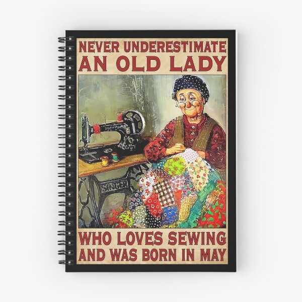 Item preview, Never Underestimate An Old Lady Who Love Sewing And Was Born In May designed and sold by HerBertTeee.