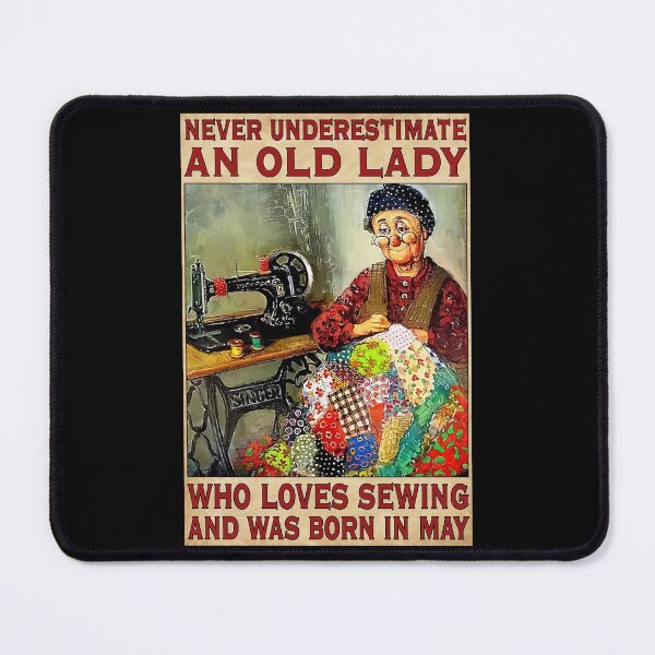 Item preview, Never Underestimate An Old Lady Who Love Sewing And Was Born In May designed and sold by HerBertTeee.