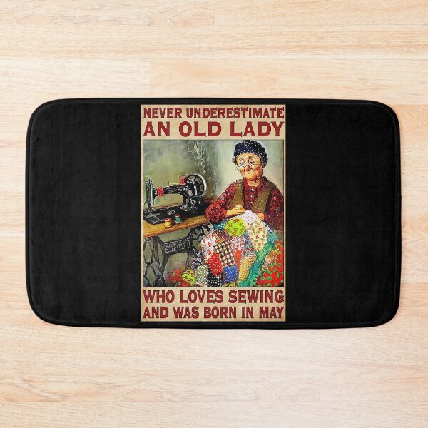 Item preview, Never Underestimate An Old Lady Who Love Sewing And Was Born In May designed and sold by HerBertTeee.