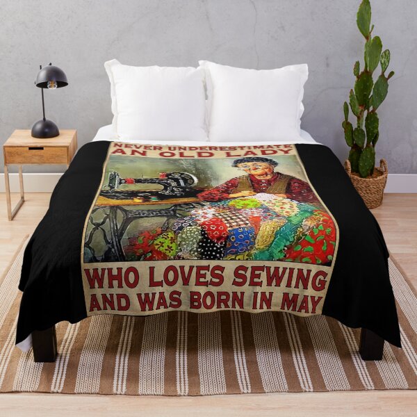 Item preview, Never Underestimate An Old Lady Who Love Sewing And Was Born In May designed and sold by HerBertTeee.