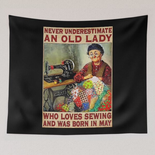 Item preview, Never Underestimate An Old Lady Who Love Sewing And Was Born In May designed and sold by HerBertTeee.