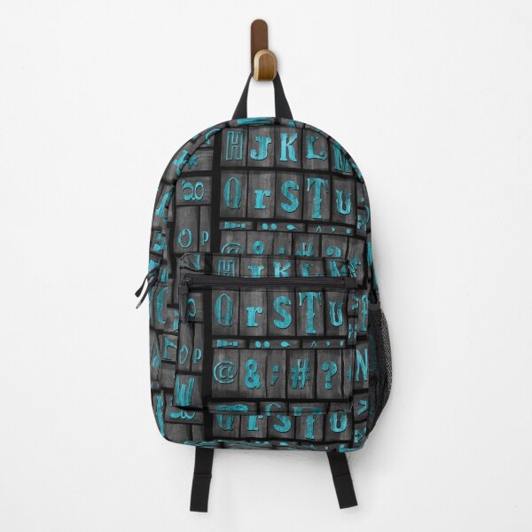 Item preview, Wood Printing press alphabet blocks in Turquoise ink designed and sold by Quick Brown Fox Canada.
