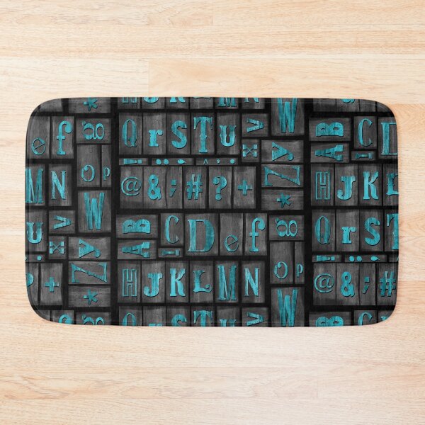 Item preview, Wood Printing press alphabet blocks in Turquoise ink designed and sold by Quick Brown Fox Canada.