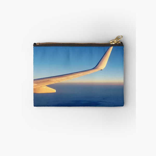 Item preview, Wing of flying Boeing 737-800 against evening sky designed and sold by Lukasz Szczepanski.