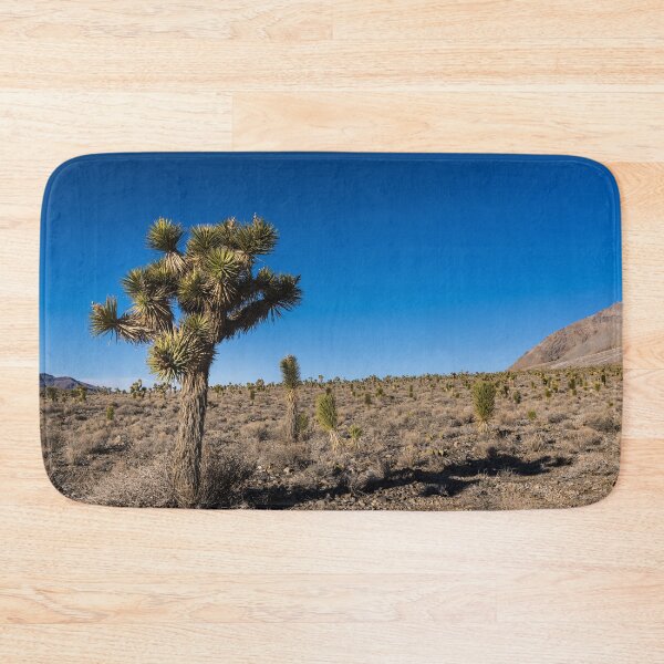 Item preview, A palm tree amid a field of like trees in Death Valley National Park designed and sold by OrcaNature.