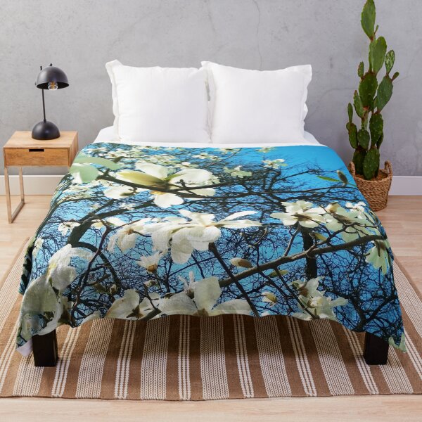 Item preview, White magnolia tree in blossom, natural background, spring season designed and sold by helenkaiy.