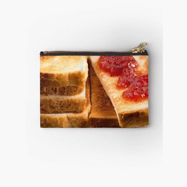 Item preview, Toasted slices of bread with strawberry jam close-up designed and sold by vladromensky.