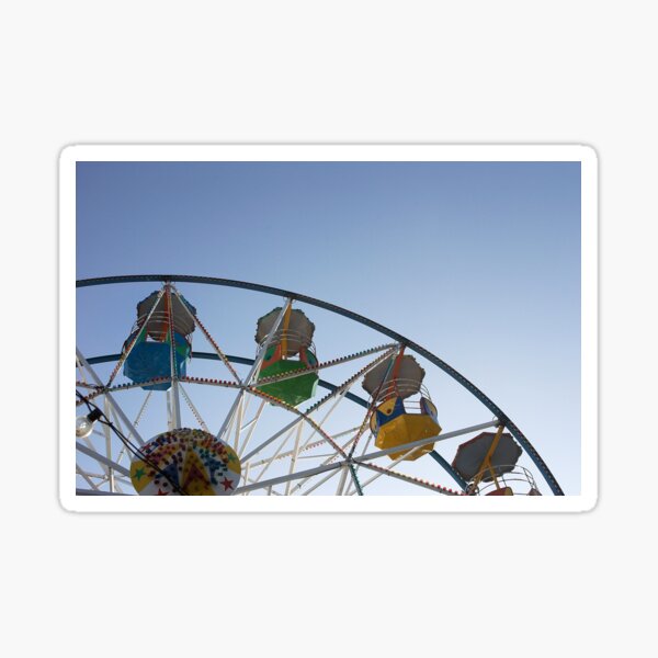 Ferris wheel at Scarborough sea front funfair, Yorkshire, UK Sticker