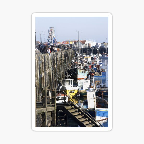Fishing boats moored along Scarborough sea front, Yorkshire, UK Sticker