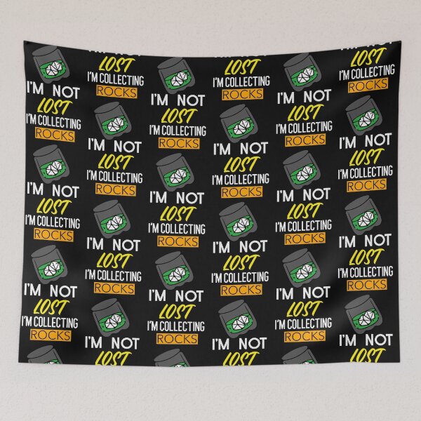 Item preview, I'M NOT LOST I'M COLLECTING ROCKS ESSENTIAL T-SHIRT designed and sold by BestCoolStuff.