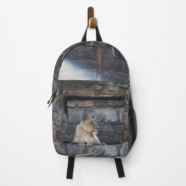Item preview, brown tiger sitting on gray and brown rock designed and sold by anil77kiran84.