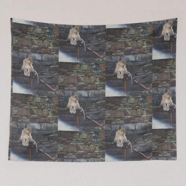 Item preview, brown tiger sitting on gray and brown rock designed and sold by anil77kiran84.